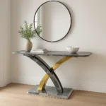 The Lucy Coffee Table is a bold centrepiece that blends sculptural elegance with modern luxury. Featuring a square marble top and a striking interwoven metal base in chrome and gold finishes, it’s designed to elevate any living space with artistic flair and premium materials. This table is part of the Lucy Collection, which includes a matching Dining Table, Console Table, and Lamp Table, all available with the same signature base and a wide range of interchangeable tops. Whether placed in a luxury lounge, a designer apartment, or a modern showroom, the Lucy Coffee Table delivers timeless style and everyday functionality.