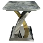 The Lucy Coffee Table is a bold centrepiece that blends sculptural elegance with modern luxury. Featuring a square marble top and a striking interwoven metal base in chrome and gold finishes, it’s designed to elevate any living space with artistic flair and premium materials. This table is part of the Lucy Collection, which includes a matching Dining Table, Console Table, and Lamp Table, all available with the same signature base and a wide range of interchangeable tops. Whether placed in a luxury lounge, a designer apartment, or a modern showroom, the Lucy Coffee Table delivers timeless style and everyday functionality.