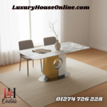 Modern designer coffee table with geometric metallic base