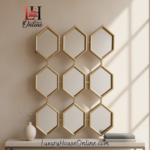 Modern gold honeycomb mirror with multiple hexagon shapes.