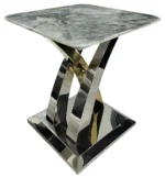 The Lucy Coffee Table is a bold centrepiece that blends sculptural elegance with modern luxury. Featuring a square marble top and a striking interwoven metal base in chrome and gold finishes, it’s designed to elevate any living space with artistic flair and premium materials. This table is part of the Lucy Collection, which includes a matching Dining Table, Console Table, and Lamp Table, all available with the same signature base and a wide range of interchangeable tops. Whether placed in a luxury lounge, a designer apartment, or a modern showroom, the Lucy Coffee Table delivers timeless style and everyday functionality.