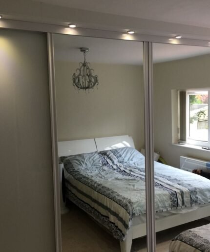 Mirrored sliding doors for sloping ceilings.