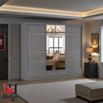 Florence high gloss sliding wardrobe with mirror and drawers in a luxury bedroom setting