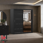 Lyon white sliding door wardrobe with large mirror in a bright modern bedroom.