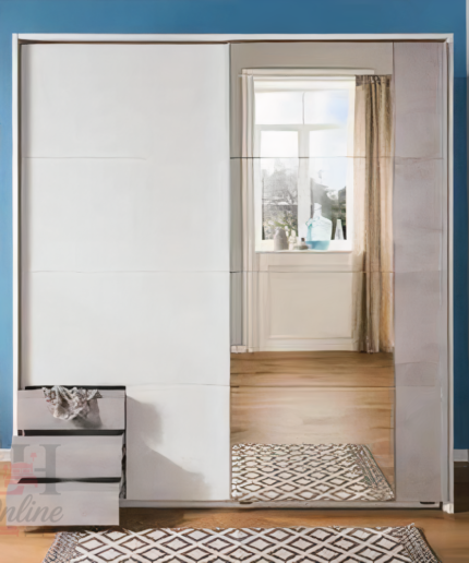 Emden sliding door wardrobe with mirror and grey drawers in a modern bedroom.